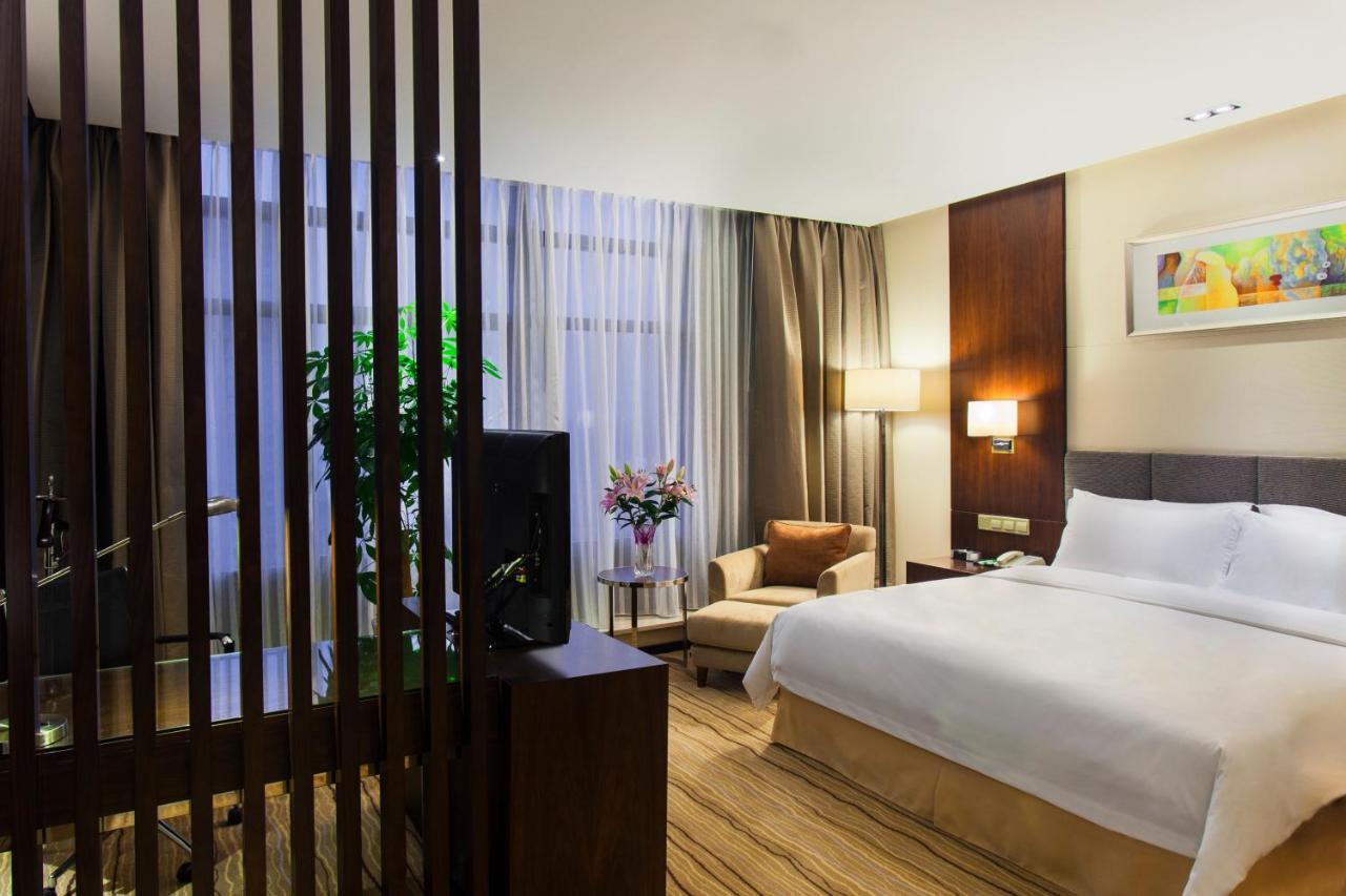 Holiday Inn Taicang City Centre By Ihg Exterior photo